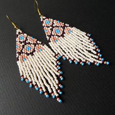 Native beaded earrings Long Beige Blue Seed bead earrings | Etsy Native Beaded Earrings, Buy Earrings Online, Handmade Hoop Earrings, Cheap Earrings, Native American Earrings, Blue Dangle Earrings, Earrings Handmade Dangle, Beaded Tassel Earrings, Buy Earrings