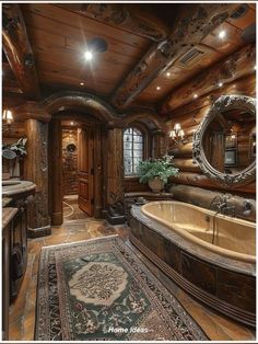 a large bathroom with a tub, sink and mirror on the wall in it's center