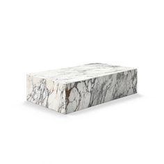 a white and black marble box on a white background