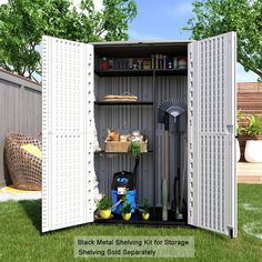 an outdoor storage shed with gardening tools in it