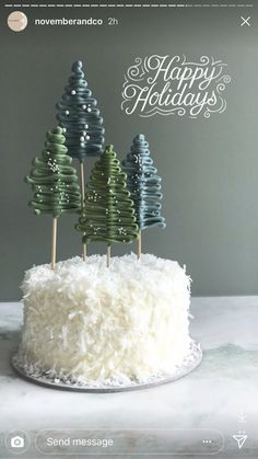 a cake with white frosting and trees on top is featured in the november / december issue