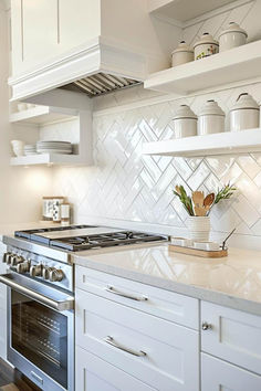 22 Herringbone Backsplash Subway Tile Ideas for a Cozy Kitchen White Backsplashes Kitchen, Cloe Tile Herringbone Backsplash, Tile Ideas For Kitchen Backsplash, Slide In Range Backsplash Ideas, White Subway Tile Herringbone Backsplash, Herringbone Kitchen Tiles, Backsplash To Ceiling Kitchen, 3x12 Herringbone Backsplash, Backsplash Ideas With Granite Countertop