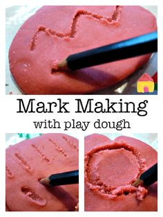 a close up of a heart shaped cake with writing on it and a pencil in the middle