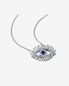 Handcrafted from 18-karat gold, this pendant is a contemporary interpretation of the ancient evil eye symbol. Featuring a 3mm round dark blue sapphire center stone for the eye, it is beautifully encircled by baguette and round white diamonds. Details 18k white gold 3mm round dark blue sapphire center stone, 0.18 carats 0.41 carats of baguette and round white diamonds Measures 18" inches in length, adjustable at 16" inches Lobster clasp fastening 20x15mm dimensions Ref: AKN150 White Diamond Necklace, Blue Sapphire Pendant, Eye Symbol, Sapphire Pendant, Ancient Symbols, Evil Eye, Diamond White, Blue Sapphire, Dark Blue