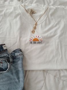 Embroidered Be the Light Colorful Sun Tshirt | Comfort Colors Christian Merch | Top Sellers | Christian Gifts  A beautiful minimalist design would make a great gift for adult baptism gift as well :)  💕MADE WITH DTG * P R I N T I N G  Designs are printed directly on the garment using DTG (direct to garment) to ensure a long-lasting, vibrant & durable finish. The process itself resembles digital printing on paper. Using this technique, pigmented water-based inks are applied to the garment's surfa White Embroidered T-shirt For Everyday, Everyday White Embroidered T-shirt, White Embroidered T-shirt, White Tops With Embroidered Text For Everyday, White Everyday Top With Embroidered Text, Adult Baptism Gifts, Gifts For Adults, Christian Gifts, Dye T Shirt