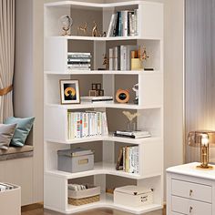 a white book shelf filled with lots of books