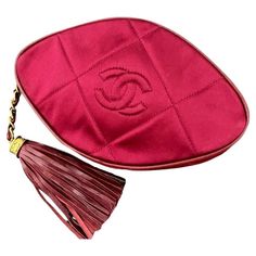 Auth CC Chanel Silk Satin And Leather Clutch Bag This small bag offers an amazing aesthetic with a eye popping red hue and Burgundy fringed leather zipper strap. The top of the bag is leather with a zipper enclosure. The zipper has an extension of leather that is fitted with gold accents, the extended leather strap has gold CC accent holding the fringe in place. The Exterior of the bag is made from majority Silk Satin. Excellent used condition. The interior is red and has one zipper enclosure. T Amazing Aesthetic, Leather Clutch Bag, Leather Clutch Bags, Leather Zipper, Leather Clutch, Small Bag, Fashion Handbags, Gold Accents, Silk Satin