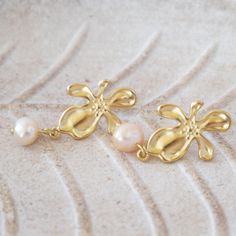 Sleek sellouts! 🤓. Order Orchid Baroque Pearl Earrings,Pearl Drop Earrings ,Vintage Style Earrings ,Pearl Jewelry, Anniversary Gift, mothers day gift at €34.00 #MinimalistEarrings #DangleEarrings #GiftForHer #VintageJewelry #BaroquePearl #titanium #PearlEarrings #PearlDropEarrings #GoldEarrings #PearlJewelry Earrings Pearl Drop, Vintage Style Earrings, Baroque Pearl Earrings, Earrings Pearl, Earrings Vintage, Style Earrings, Fun Earrings, Pearl Drop Earrings, Pearl Drop