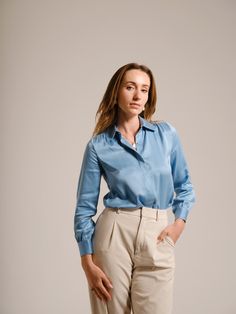 Long Sleeves Collared Pure Silk Shirt with delicate frowns on the shoulder and cuffs provides a subtle sheen and a smooth texture. It's designed with a classic point collar and a button-up front, which adds a touch of elegance suitable for both office and casual wear. The shirt is tailored to offer a relaxed fit, enhancing comfort while maintaining a sleek and stylish silhouette. This versatile piece can be easily paired with trousers or skirts for a polished look. - 100% Mulberry Silk, Sandwash Blouse Long Sleeve, Office Lady, Silk Shirt, Office Ladies, Smooth Texture, Mulberry Silk, Polished Look, Silk Blouse, Pure Silk