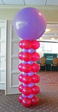 a balloon column in the middle of a room