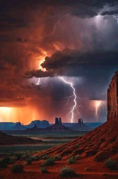 lightning strikes in the sky over desert landscape