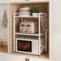 a microwave oven sitting on top of a wooden shelf