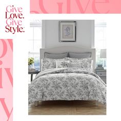 a bed in a room with pink and white decor