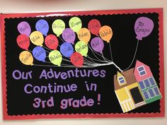 a bulletin board with some balloons attached to it that says our adventures continue in 3rd grade