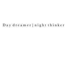 the words daydreamer night thinker written in black ink on a white background