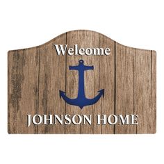 a wooden sign with an anchor and the words welcome to johnson home on it