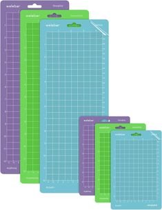 three cutting mats are shown in purple, green and blue colors with the same size