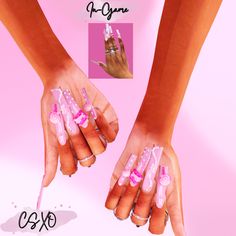 two hands with pink and white nail designs on them, one holding a manicure