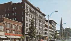 an old photo of a city street in the early 20th century