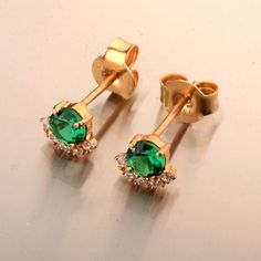 All Silver items will be shipped via standard shipping and will be delivered in 2 to 3 weeks after the shipment. All gold items will be shipped via express shipping and will be delivered in 5 to 10 days after the shipment. Half Halo Lab Grown Emerald and Diamond Studs, 14k Gold Emerald Earrings, Green Stone Earrings, Sterling Silver Stud Earrings, Everyday Stud  ❖ Details For Pair  ◽ Gemstone : Lab Grown Emerald/ Moissanite / Lab Grown Diamond ◽ Color : Colorless ◽ Clarity : VVS ◽ Stone Size : 5mm and 1.5mm Apporx.  ◽ Made to Order ◽ Gold Karat : 925 Sterling Silver, 10k / 14k / 18k Gold ◽ Available in Rose Gold, Yellow Gold, White Gold  ❖ Processing   All items in our shop are made to order, handmade, no stock with utmost care. Please allow up to 3-4 weeks for your piece to be crafted.  ❖ Green Cluster Earrings Gift, Green Cluster Earrings As A Gift, Gold Emerald Earrings, Green Stone Earrings, Gold Items, Emerald Earrings Studs, Silver Items, Earrings Everyday, Sterling Silver Stud Earrings