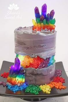 there is a cake that has many colors on it