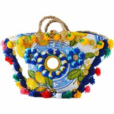 Handcrafted Sicilian “coffa” bag, made with the finest quality Sicilian dwarf palm and bright, beautiful embellishments traditional to Sicily. Your bag will be made to order by our artisan Luigi in Palermo, who with his children, are some of the last remaining practitioners of this art. Each bag is created by hand, and while yours will be similar, it will not be identical to the one pictured. Luigi's secret pom-pom technique creates a batch large enough for exactly one bag, so each design is ine Designer Multicolor Handmade Bags, Designer Handmade Multicolor Bags, Designer Multicolor Handmade Shoulder Bag, Designer Handmade Multicolor Shoulder Bag, Designer Multicolor Bag With Braided Handles, Designer Multicolor Bags With Braided Handles, Luxury Handmade Bags For Vacation, Traditional Multicolor Top Handle Bag, Sicily Bag