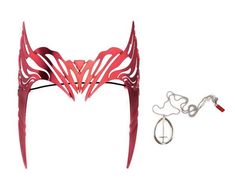 A MIND-BENDING PROP REPLICA SET Make your reality Marvel-ous with this officially licensed WandaVision prop replica set. This stunning 2-piece set includes an authentic replica of Wanda Maximoff's Scarlet Witch tiara and Monica Rambeau's S.W.O.R.D. necklace. Perfect for cosplay or display, these must-have Marvel accessories come packaged in a branded collector's box. If you've been feeling weird-y all day, then maybe you need a dose of magic. Guaranteed to wow even the most skilled witch, you wi Scarlet Witch Tiara, D Necklace, Marvel Jewelry, Chaos Magic, Red Crown, Intelligence Agency, Book Enthusiast, Magical Gift, Puzzle Shop