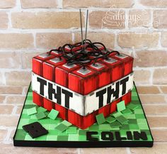 a cake made to look like a cube with the words that tht folln on it