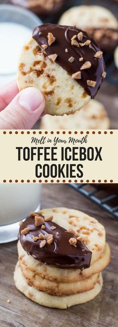 a person holding up a chocolate covered toffee icebox cookie in front of some cookies