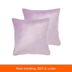 two pillows with the words now trending, $ 50 & under