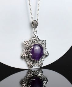 "This beautifully handcrafted filigree art daisy flower pendant feature with Amethyst gemstone. Exquisitely crafted, handmade daisy flower pendant necklace would be your perfect option for anniversary, birthday, thanksgiving or Christmas gift for yourself or loved one.  For gold plated option, visit that link; https://www.etsy.com/FiligranUSA/listing/1401924202 The optional silver chain length is 18.00\" (45.7 cm)  + 2.00\" (5.10 cm) extension.  The Amethyst gemstone diameter is 16 mm, cabochon Emo Jewelry, Feminine Tattoo, Birthday Thanksgiving, Silver Jewelry Necklace, Filigree Pendant, Art Pendant, Jewelry Fashion Trends, Flower Pendant Necklace, Charm Pendant Necklace