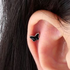 This beautiful butterfly stud is crafted with durable stainless steel and feature a stunning black enamel finish. With the choice of gold or silver plating, it is perfect for adding a touch of elegance to an outfit. Detail： -Post material: Gold plated stainless steel or stainless steel -Used in healed piercings. -Tarnish proof and durable so you can wear it everyday without worry! Quantity & Measurement：-Gauge: 20g | 0.8mm-Post length: 6mm-Size: 4.5*6.3mm-Ball: 4mm-Include: single item-Hypoaller Back Piercings, Beautiful Butterflies, Black Enamel, Free Jewelry, Jewelry Care, Silver Color, Screw, Gold Color, Silver Gold