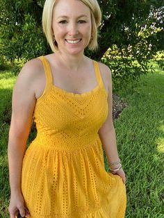 This yellow eyelet midi dress with pockets is the perfect amount of feminine, flirty, classy, and happy this summer! With a cinched waist, eyelet pattern, zipper back, and ruffle bottom, this dress will take you from day to night in ease! Pair with a clutch and espadrilles and you're summer ready! Brand: Skies are BlueDescription: Yellow eyelet sleeveless midi dress; back zipper; pockets; cinched waist; linedFit Info: True to Size, Whitney wears a SmallLength: The length hits mid calfBust: The b Sleeveless Eyelet Midi Dress, Spring Sleeveless Eyelet Midi Dress, Sleeveless Eyelet Midi Dress For Spring, Sleeveless Eyelet Midi Dress For Summer, Fitted Eyelet Midi Dress For Summer, Eyelet Midi Dress, Midi Dress With Pockets, Dress Back, Sleeveless Midi Dress