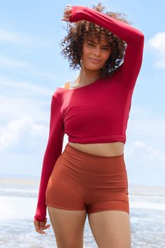 Introducing our buttery-soft, stretchy, long-sleeve wrap top in the rich hue of Raspberry. Able to be worn back-to-front, this versatile cover-up is perfect for wearing in or out of the water. Designed to be paired with your favourite bikini top or bra underneath. Style over the swim sets from our Guyulgang or Gaia Collections, or pair with your favourite Dahlia Wrap Skirt. Versatile Stretch Wrap Top With Long Sleeves, Versatile Stretch Long Sleeve Wrap Top, Versatile Long Sleeve Stretch Wrap Top, Versatile Stretch Wrap Top, Fitted Wrap Top For Fall, Versatile Fitted Long Sleeve Wrap Top, Bathing Suit With Sleeves, Swimwear Long Sleeve, Swimwear Long