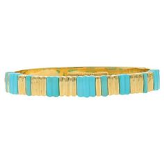 Brand: Tiffany & Co. Metal Content: 18k Yellow Gold Stone Information Natural Turquoise Treatment: Routinely Enhanced Cut: Carved Color: Greenish Blue Style: Hinged Bangle Fastening Type: Tab Box Clasp with One Side Safety Clasp Features: Ribbed Detailing Measurements Inner Circumference: 6 1/2" Front Width: 11/32" (8.5mm) Back Width: 11/32" (8mm) Weight: 33.4 Grams Stamps: 750, Tiffany & Co., copyright symbol, 2000, Hong Kong This fabulous designer bangle is accompanied by an iconic Tiffany Blu Tiffany And Co Bracelet, Copyright Symbol, Box Clasp, Greenish Blue, Bangle Designs, Tiffany And Co, Gold Stone, Blue Style, Hinged Bangle