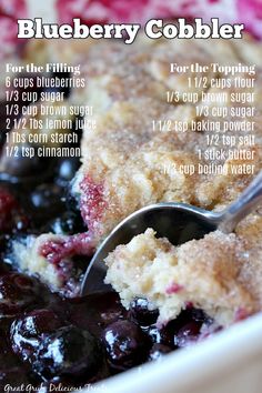 a blueberry cobbler is shown in a bowl with a spoon