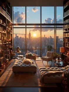 a living room filled with lots of furniture and bookshelves in front of large windows