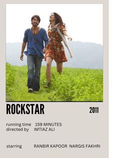 an advertisement for rockstar featuring two people walking in the grass and one is holding a baseball bat