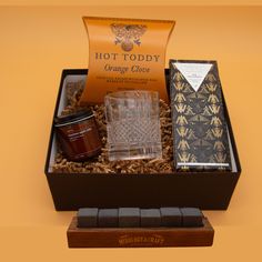 an assortment of items in a gift box on a yellow background with the words hot today