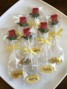 chocolate roses wrapped in cellophane on a plate