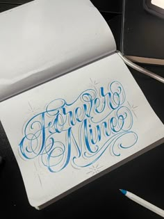 a piece of paper that has some type of writing on it with the words forever mine written in blue ink