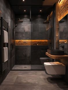 a bathroom with a toilet, sink and shower stall in the middle of it's walls