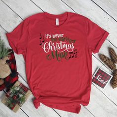 Christmas Tshirt says "It's Never too early for Christmas Music" We do not use heat transfer vinyl, iron on transfers or screen printing. We use a cutting edge professional DTG printing process that puts eco-friendly ink directly into the fabric.Available in S, M, L, XL, 2XL. UNISEX SIZING - when ordering for women If you want a tighter fit, order a size smaller. * S (SUGGESTED SIZE 2-4) 17” Width. 24.5” Length.* M (SUGGESTED SIZE 6-8) 19” Width. 25” Length.* L (SUGGESTED SIZE 10-12) 21” Width. Funny Christmas Shirts For Women, Moose Family, Grandma Bear, Christmas Shirts For Women, Christmas Vinyl, Bear Shirt, Christmas Music, Shirts For Women