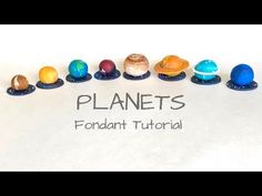 a group of planets sitting on top of each other in front of a white background