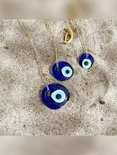 This Glass Evil Eye Necklace is more than just a piece of jewelry; it's a Symbol of Protection and Positive Energy. The intricately designed Big Glass Evil Eye Pendant captures attention and keeps Negative Vibes away. Encased in an exquisite jewelry box, it's a gift that's already dressed to impress, making it the perfect choice for her Christmas Surprise. #evileye #necklace #evileyenecklace #greekevileye #evileyejewelry #muranoevileye #muranonecklace #evileyenecklace #christmasgiftideas Party Jewelry With Birthstone, Handmade Jewelry For Party Gifts, Handmade Jewelry For Parties And Gifts, Round Glass Jewelry For Parties, Handmade Jewelry For Party And Gift-giving Occasions, Round Glass Party Jewelry, Nickel Free Necklace Gift, Blue Jewelry For Birthday Gift, Spiritual Blue Jewelry For Birthday