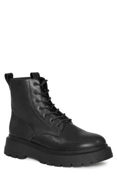 A superchunky lug sole extends the utilitarian aesthetic of this combat boot crafted of leather with dual pull-loops for easy-on wear. Leather upper and lining/synthetic sole Imported Rugged Moto Boots With Lug Sole For Streetwear, Chunky Leather Combat Boots For Fall, Urban Combat Boots With Round Toe For Fall, Fall Urban Combat Boots With Round Toe, High-top Lug Sole Combat Boots For Work, Urban Lug Sole Boots For Fall, High-top Combat Boots With Lug Sole For Work, Urban Boots With Lug Sole For Fall, Urban Platform Boots With Lug Sole And Round Toe