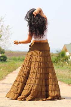 All items are shipped to Thailand Post . Free upgrade to D.H.L Express when you buy 2 or more items . The USA only. Please leave a phone number with orders. Full-length skirt in a beautiful soft cotton Boho style skirt with 10 tiers and 10 layers of ruffles all around and half lined. Drawstring waist with a small 7'' inch long zip. A great skirt to wear with a tight or cropped top. Easy to care for wash cold cycle, hang to dry or tumble dry low. Waist 33'' inches max ( drawstring ) Length 44'' i Bohemian Cotton Flared Mini Skirt, Bohemian Full-length Cotton Skirt, Brown Cotton Long Skirt, Long Brown Cotton Skirt, Bohemian Brown Pleated Maxi Skirt, Brown Long Cotton Skirt, Hippie Wrap Skirt With Lined Detail, Casual Cotton Tiered Wrap Skirt, Brown Ruffled Flared Skirt