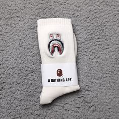 A Bathing Ape Crew Socks Shark Head Mens Womens Unisex Size: One Size Fits All Color: Off White Gray Brand New In Packaging. Fast Shipping! 1 Day Shipping And Handling. Hype Pics, Shark Head, Unusual Clothes, Wallpapers Cartoon, Type Shi, Xmas List, Lovely Flowers Wallpaper, Cool Wallpapers Cartoon, Flowers Wallpaper