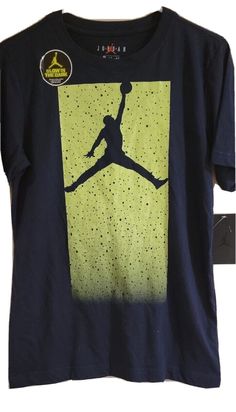 This Air Jordan T-shirt is perfect for young basketball enthusiasts. The shirt features a crew neckline with short sleeves and a pullover closure. The blue shirt with green accents has a bold graphic logo that adds to its style. Made to last, this shirt is perfect for all seasons - winter, summer, fall or spring. The shirt is available in size large and is perfect for young boys who are fans of the Air Jordan brand. It is a great addition to any casual outfit and is sure to make a statement. Navy Crew Neck T-shirt For Spring, Navy Graphic Print Crew Neck Top, Navy Long Sleeve Summer T-shirt, Navy Graphic Tee With Screen Print, Navy Graphic Tee With Graphic Print, Navy Crew Neck Top With Screen Print, Navy Casual Tops With Screen Print, Navy Casual Top With Screen Print, Navy Graphic Tee With Short Sleeves