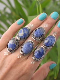 "Peruvian rings, adjustable to every ring size. These blue gemstone rings are crafted out of alpaca silver and decorated with Sodalite stone for calmness and emotional balance. ♡ With every purchase you directly support a handicraft artisan in Peru! CHOOSE YOUR RING Every ring is unique because we only use natural stones. Pick your favourite(s) and select the corresponding number(s) when ordering. You'll receive exactly the same as shown in the pictures. More ethnic (gemstone) rings: https://www